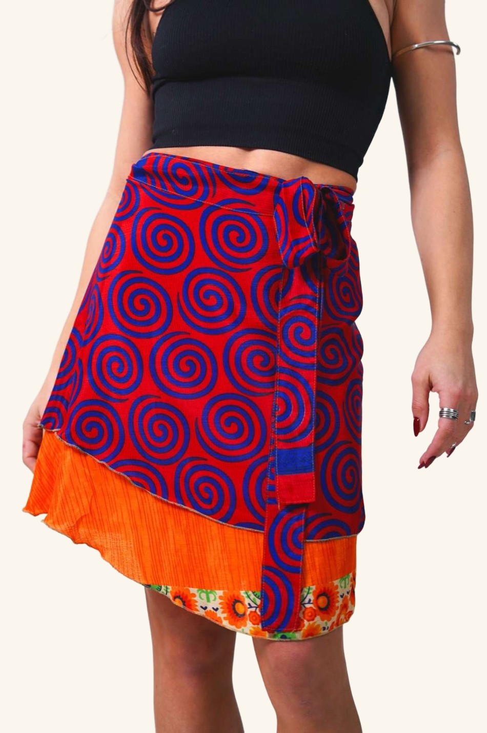 Short wrap skirt with blue spirals on model