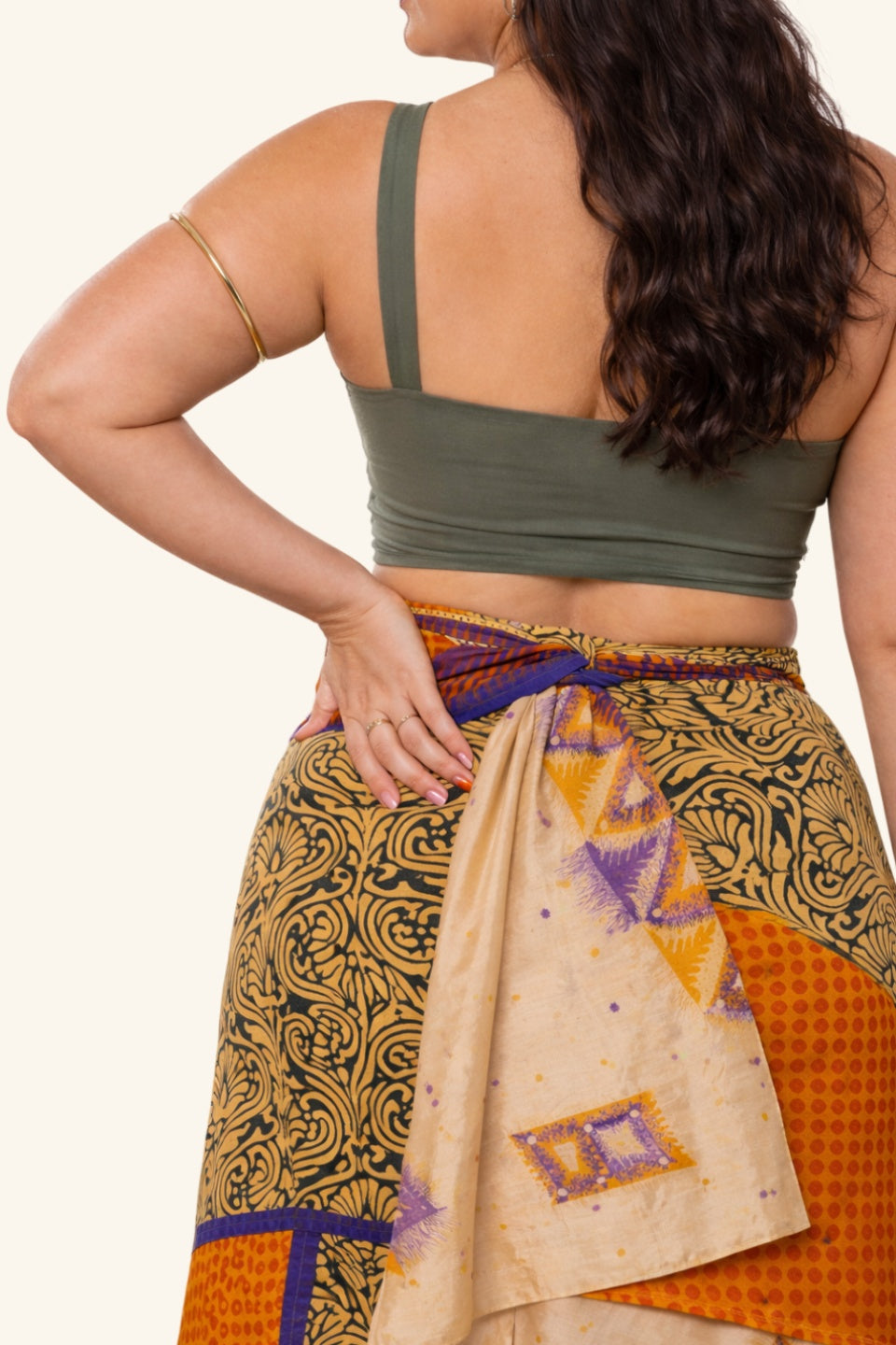 long wrap skirt with bold leaf motif on model detail picture