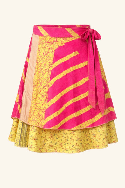 Two-layered skirt with pink top and yellow bottom on a white background