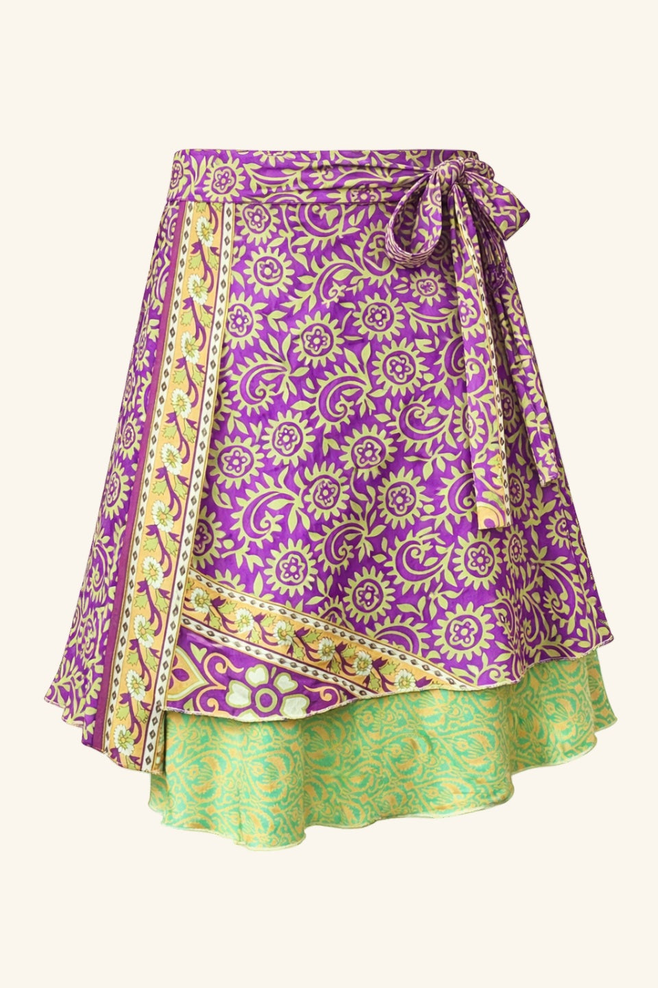 Purple and green patterned skirt on a white background