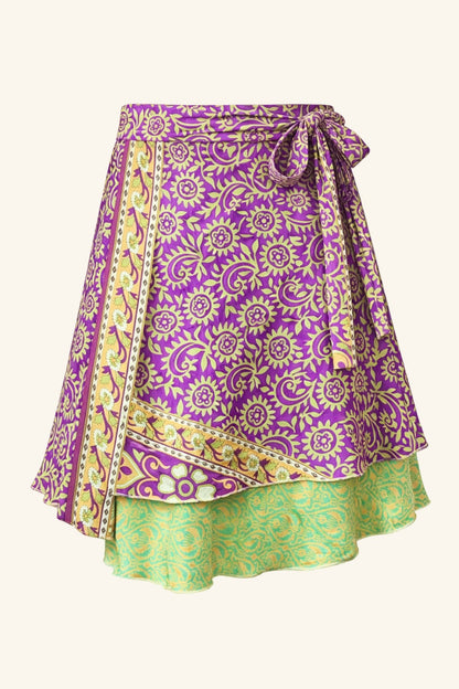 Purple and green patterned skirt on a white background